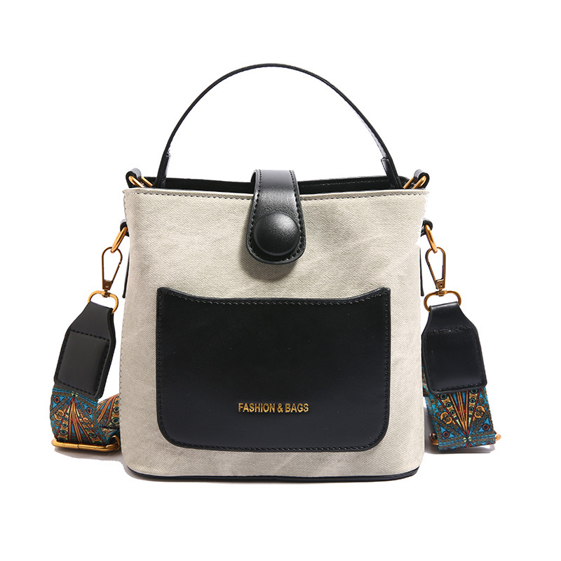 Bolsa de cubo portátil popular de comercio exterior para mujeres 2025 nuevo color de contraste universal bolso de hombro retro moda mochila