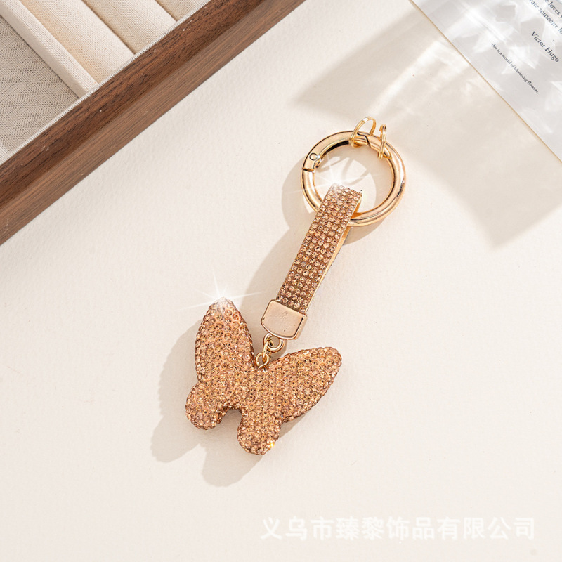 ダイヤモンドがちりばめられた粘土蝶車のキーホルダー金属かわいい女性のバッグペンダントキーチェーンリングダイヤモンドロープレザーロープギフト|undefined
