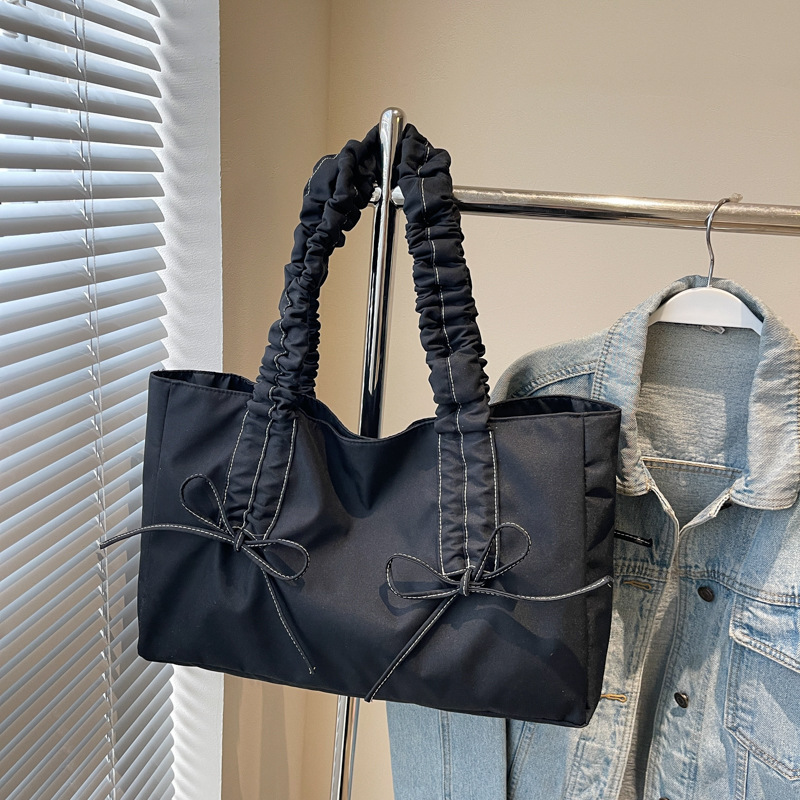 Bolsa de hombro de nicho coreano, bolso de viaje de arco, bolso de mano de mujer, bolso casual de gran capacidad, simple.