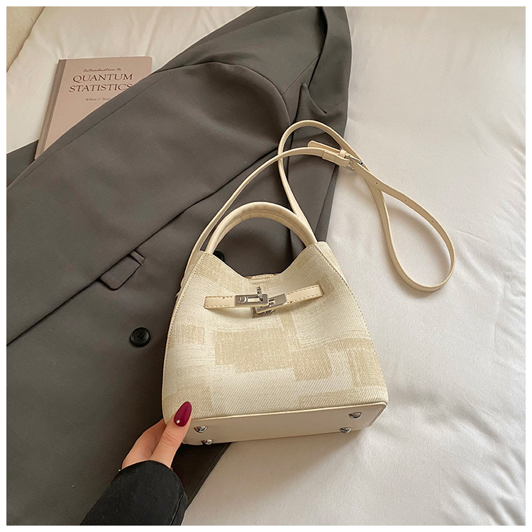 Comercio exterior transfronterizo coreano simple nicho de diseño de moda bolso de cubo para mujeres 2026 nuevo tipo de mujer mochila de hombro