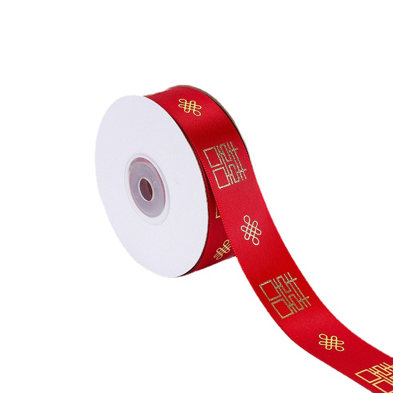 Venta al por mayor de poliéster dorado cinta de la boda decoración de la boda de vacaciones Cinta Roja en stock 2,5 cm Paquete de boda edredón cuerda