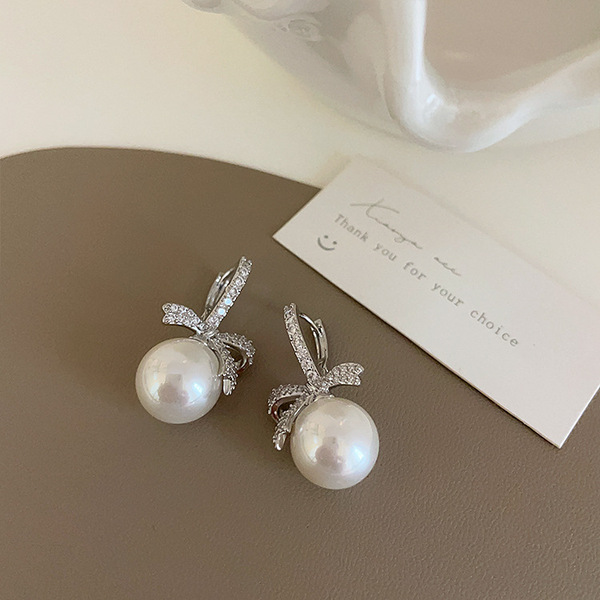 Design retro universal elegant earrings with zircon with bow from…