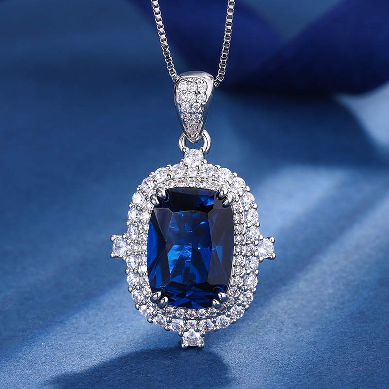 2023 nuevo estilo Zhuang Sheng joyas cobre inferior chapado en oro simulación azul señaló cristal retro europeo y americano traje femenino piedra principal 10*14