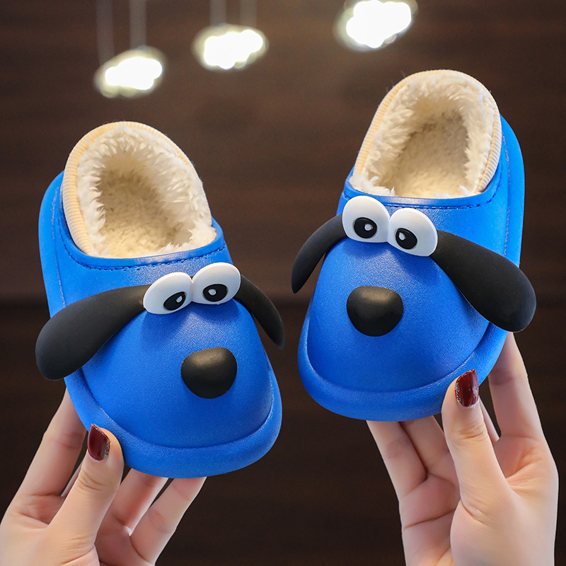 Zapatillas de algodón de invierno para niños dinosaurios de dibujos animados bebés lindos calentadores para niños y niñas con una base suave interior engrosada zapatos de algodón domésticos