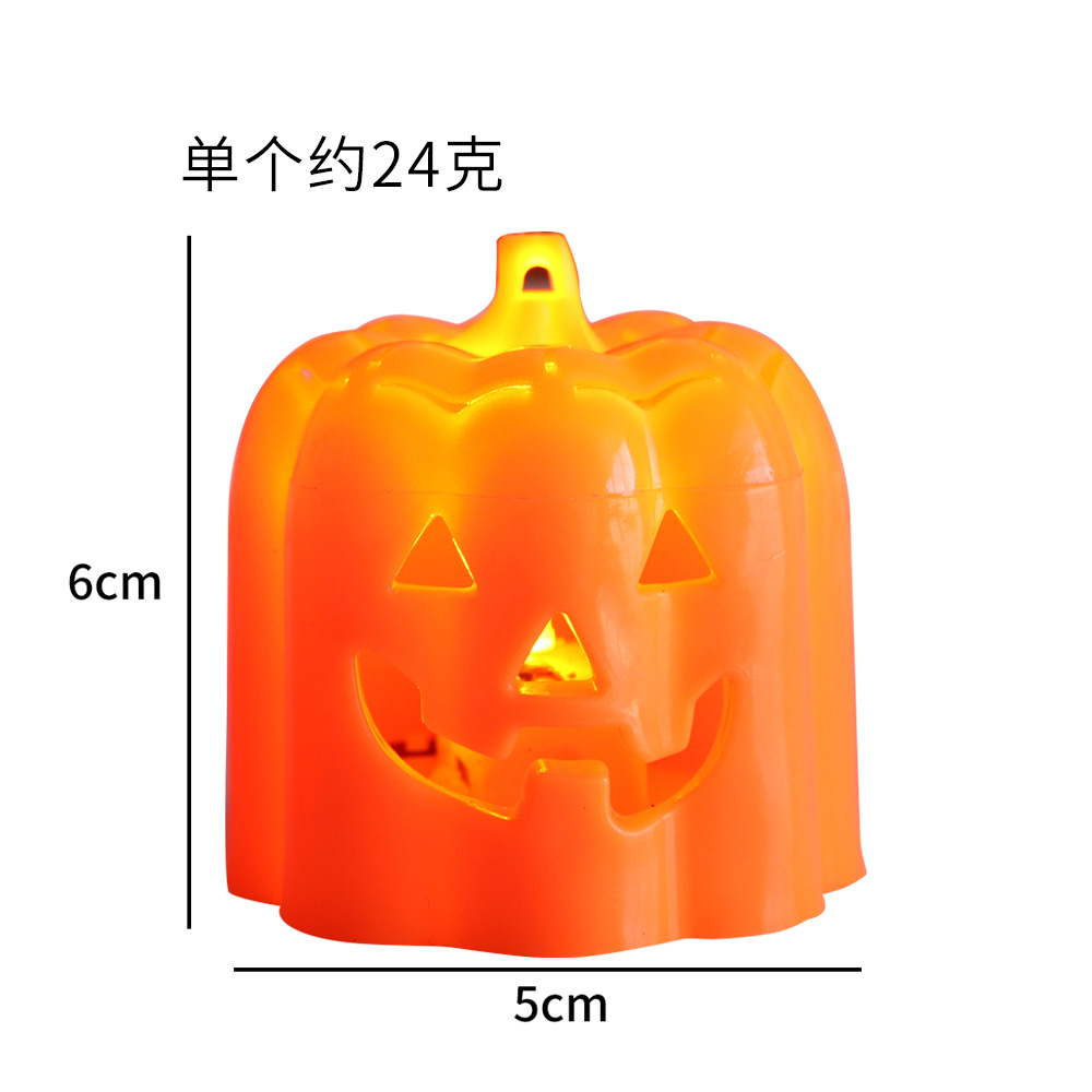 Expresión de ojo triangular de calabaza de Halloween con luz cálida.