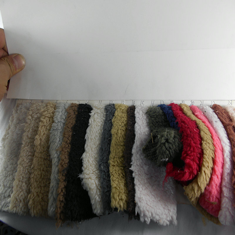 现货加厚单面北极绒长毛贵妃绒植棉绒秋冬时装保暖家纺装饰面料。