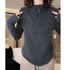 美ラード秋冬の新型は発熱した徳絨立襟のカーディガンの女性の高弾の百合の底のシャツを重ねて上着を着ます。
