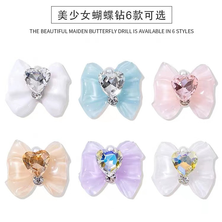 White nail decoration with bow