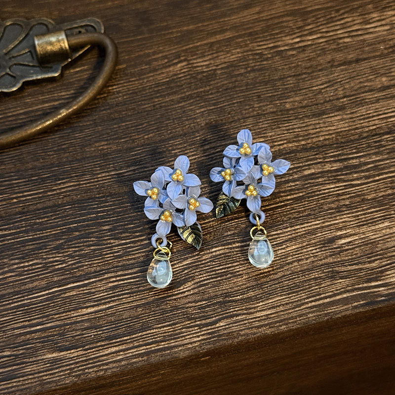 Aguja de plata, flores, hojas, borlas, pendientes, moda, retro, nuevos pendientes chinos, pendientes de temperamento, sentido de clase alta de nicho al por mayor