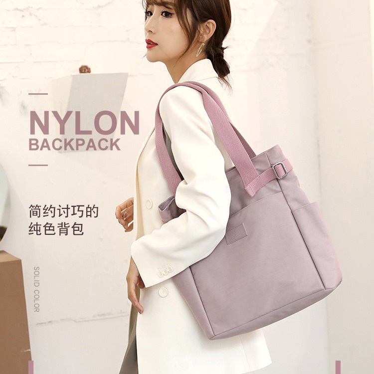 Nuevo bolso de hombro versátil de nailon para mujer, bolso de tela informal a la moda, bolso de lona para mujer, bolso de mano con gran capacidad