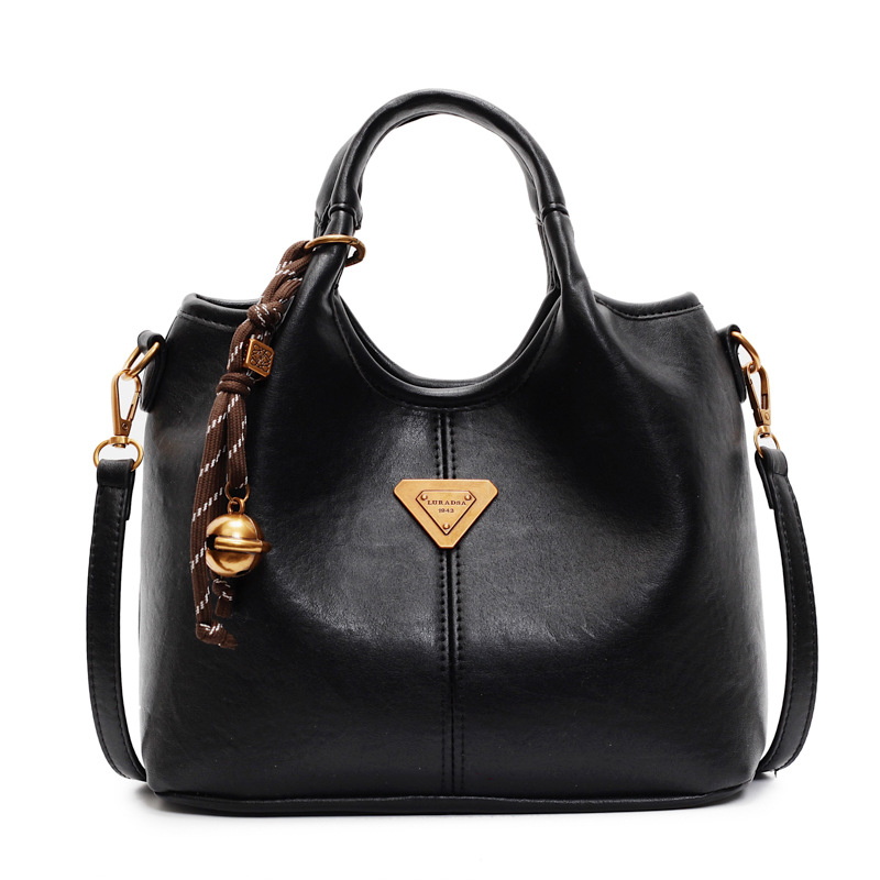 Bolsa de cubo de mano de moda casual para mujeres 2024 invierno nuevo estilo coreano retro alta sensación de moda bolso de hombro