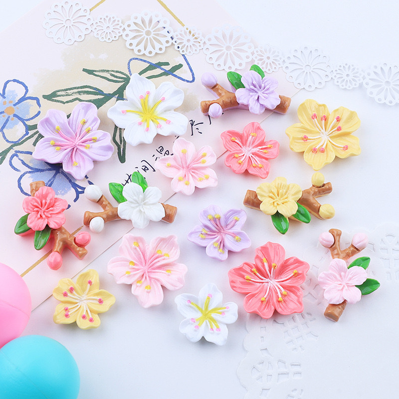 Nuevos accesorios de bricolaje de flor de durazno de resina rosa, zapatos con agujeros de pegamento de crema, fundas para teléfonos móviles, accesorios para el cabello, material de imán para refrigerador al por mayor