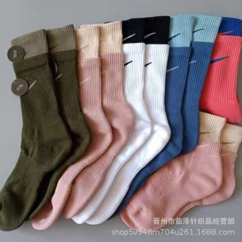 Suwan Neskett socks color stitching men's and women's couples socks long tube sports towel bottom socks wholesale