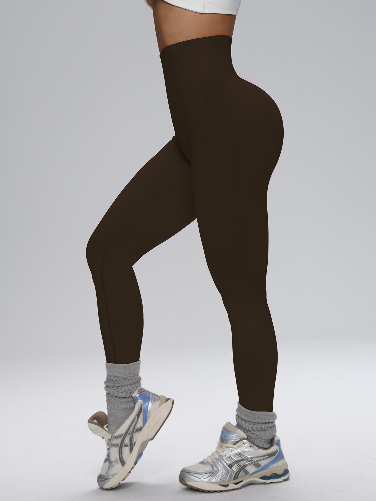 Europa y los Estados Unidos sin costuras cintura alta pantalon de gimnasio de alta cadera para mujeres corriendo al aire libre apertado nueve pantalones de pelusa de miel
