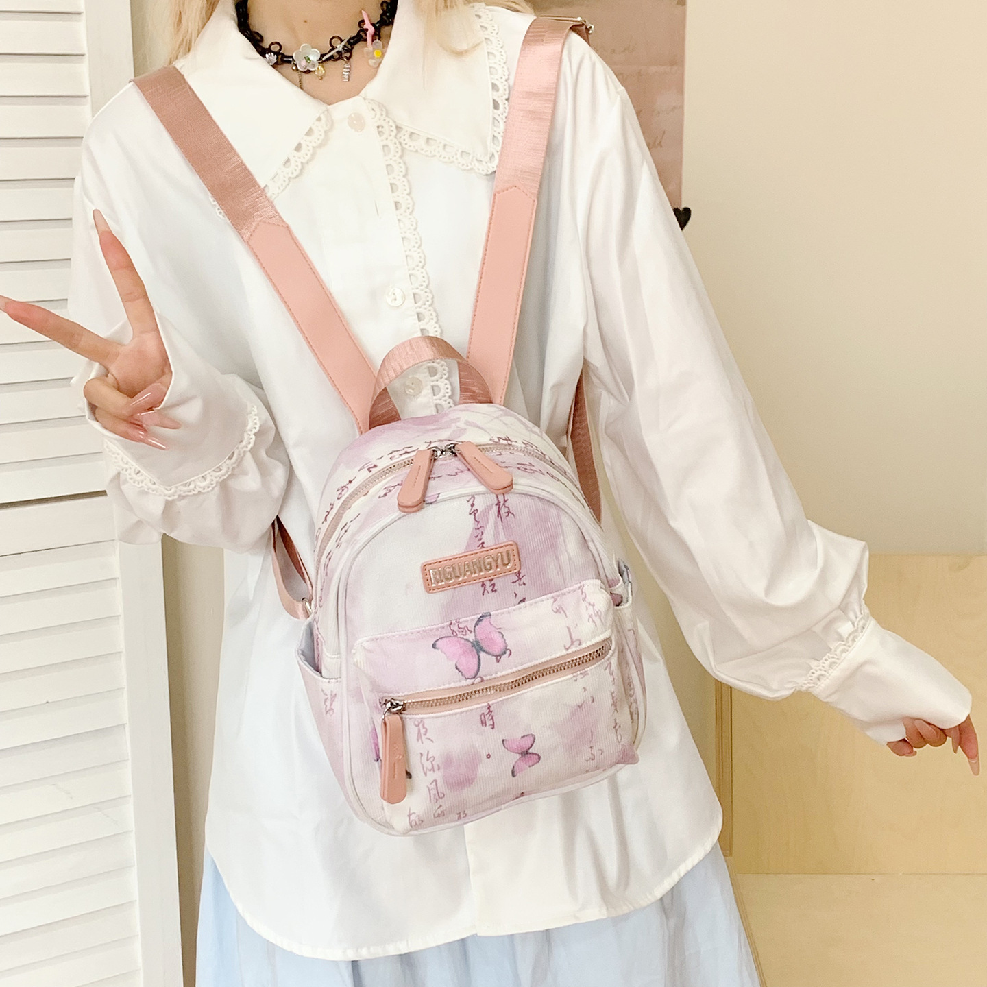 Nueva moda china nicho mochila para niños y niñas adorable mariposa impresión mochila de estudiantes 2026 nueva mochila infantil