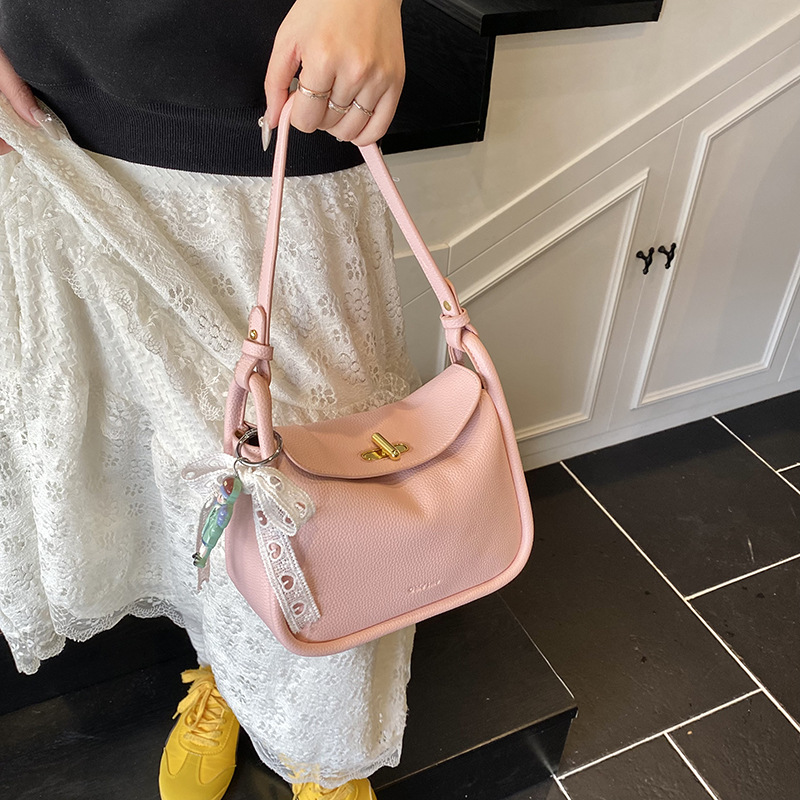 Bolso de brindis de diseño de nicho para mujer 2025 nuevo bolso de mano con patrón de lichi coreano, bolso de almohada de mensajero de un solo hombro