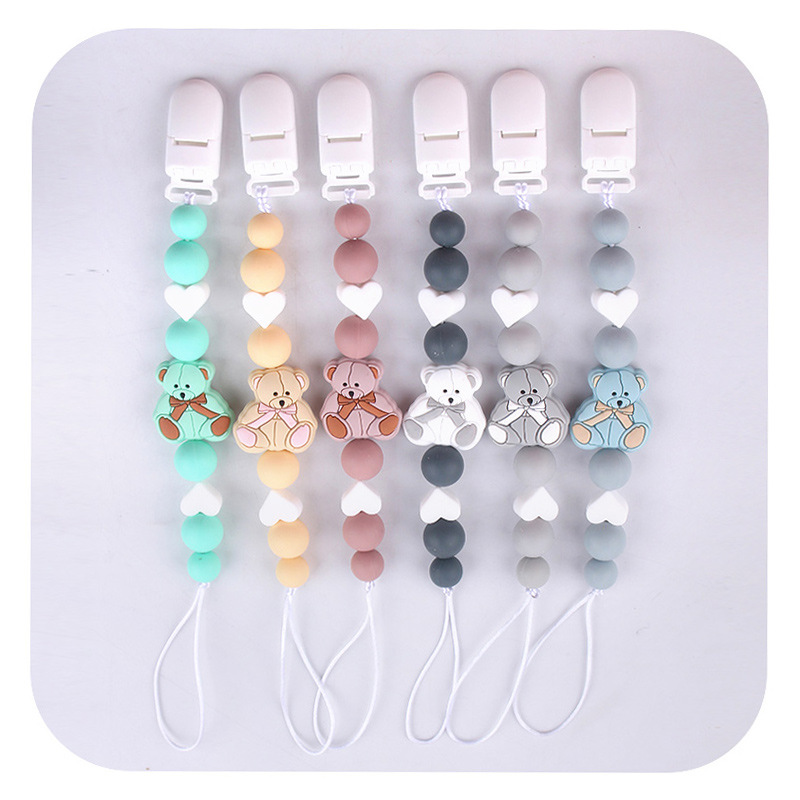 Nuevos animales de dibujos animados osos tetas de goma de silicona para bebés dientes molares juguetes de goma de silicona cadena de tetas