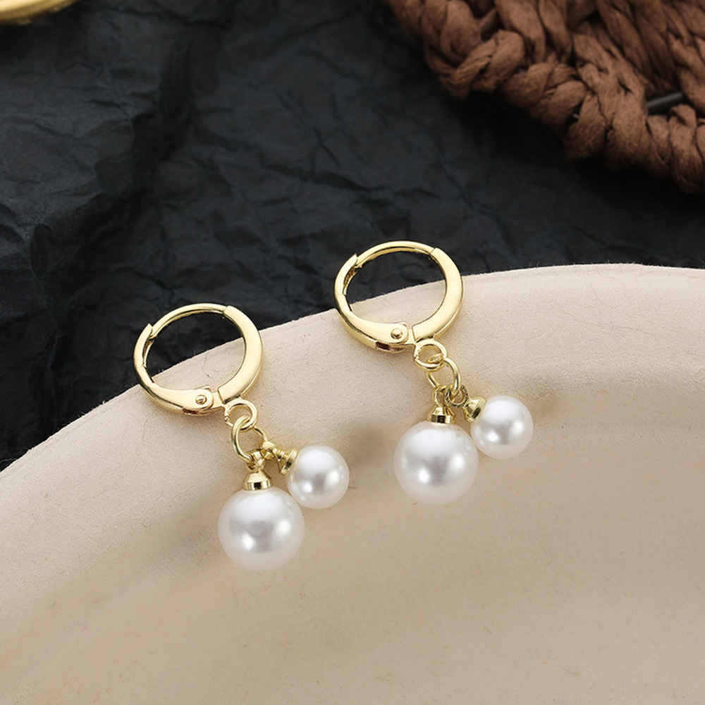 Aguja de plata de moda alta sensación de diamante de goteo de aceite pendientes nicho universal elegante pernos de orejas ligero lujoso temperamento simple orejas para mujeres