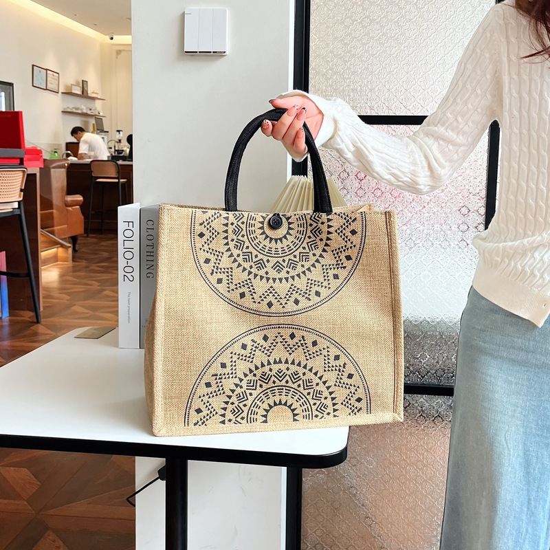 新商品の綿麻のハンドバッグのプリントのお弁当の手提げ袋の大容量の手提げ袋はアルファベットのプリントの女性のカバンを包んで卸売りします。|undefined