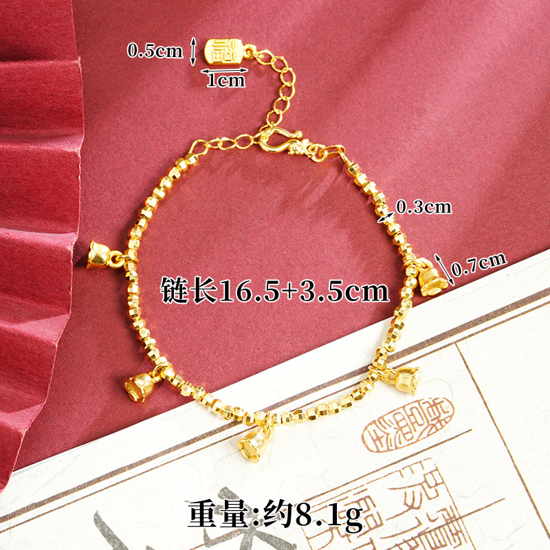Brazalete de oro de arena de Vietnam lujoso ligero bungee ojo de gato mariposa campana de cuatro hojas brazalete joyería de aleación de cobre al por mayor