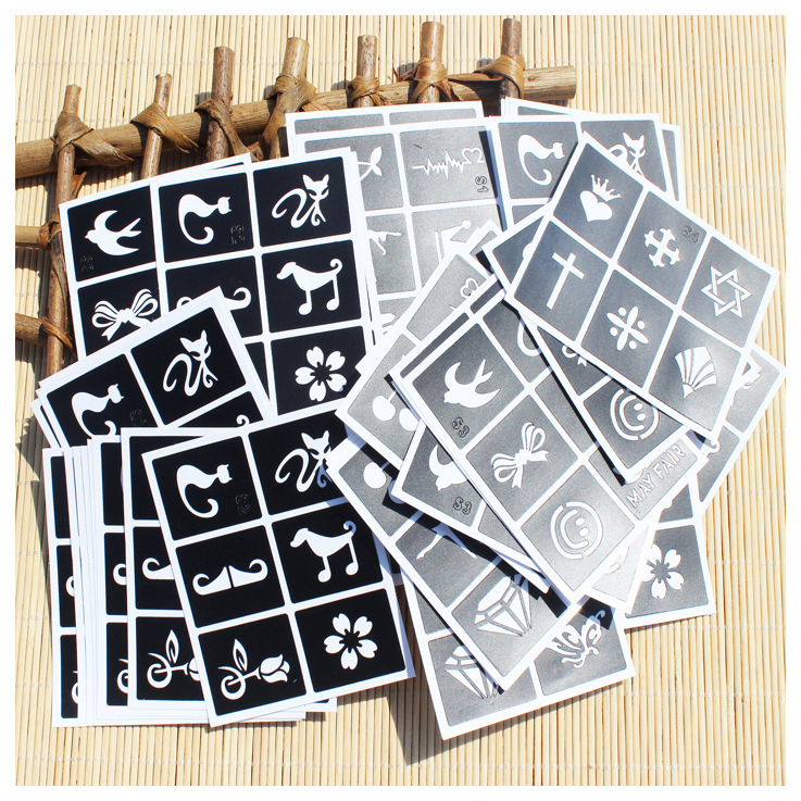 Ventas transfronterizas de tatuaje caliente bolígrafo de pintura corporal humano con accesorios pegatinas agujeradas bolígrafo de pintura infantil en stock