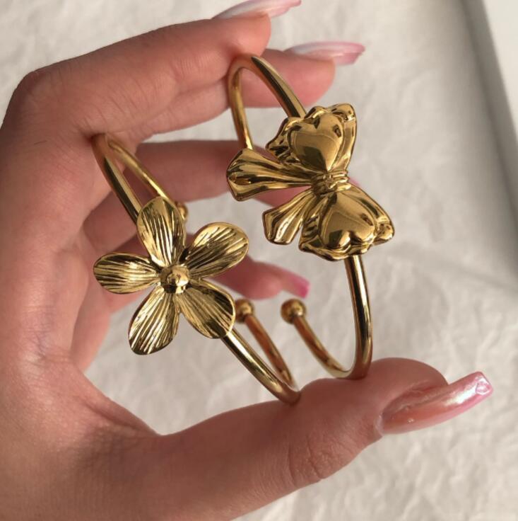 Pulsera dorada con lazo de estilo barroco retro europeo y americano, pulsera de apertura ajustable con sentido de diseño de nicho