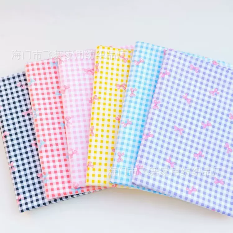 工厂优惠 秋季斜纹印花布服装宠物布料 新款睡衣棉布 小花蝴蝶结