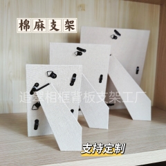 高級綿麻フォトフレームバックフレームの実木卯ほぞフォトフレームの後期に台を並べて支えます。