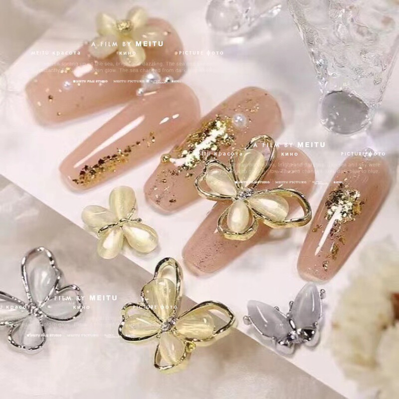 Popular Internet Hollow Cat's Eye Bow Nail Drill Stereo Alloy Cat's Eye Butterfly Nail Decoration Accessories