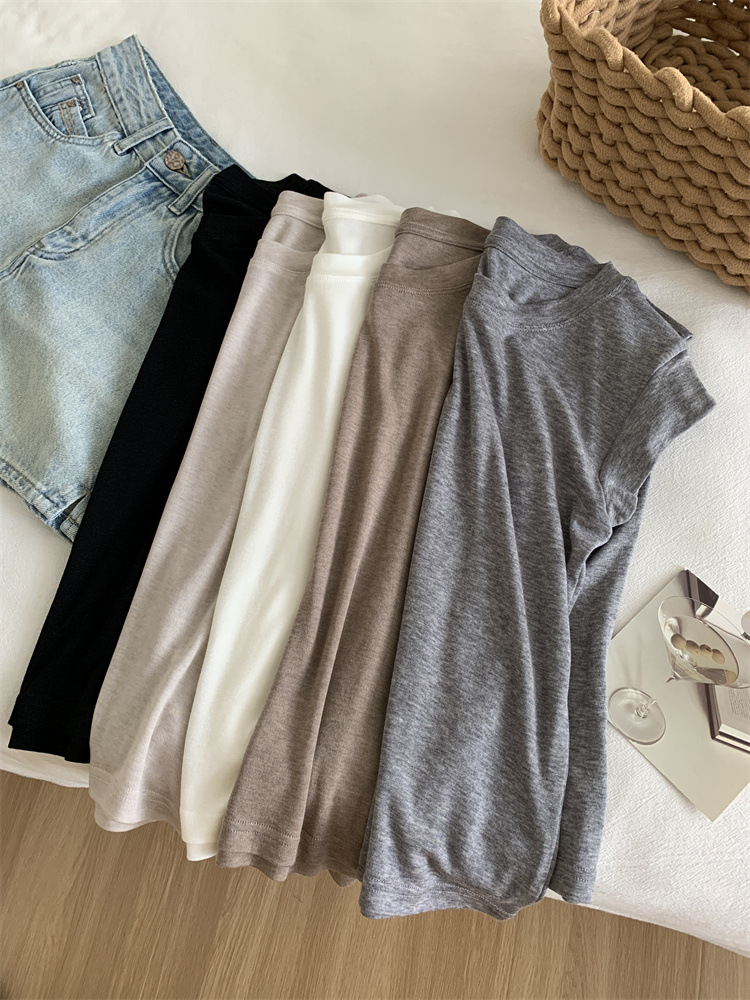 夏の新型丸首の小さい飛袖tシャツの女子学生の薄い金は身を修めてやせています。