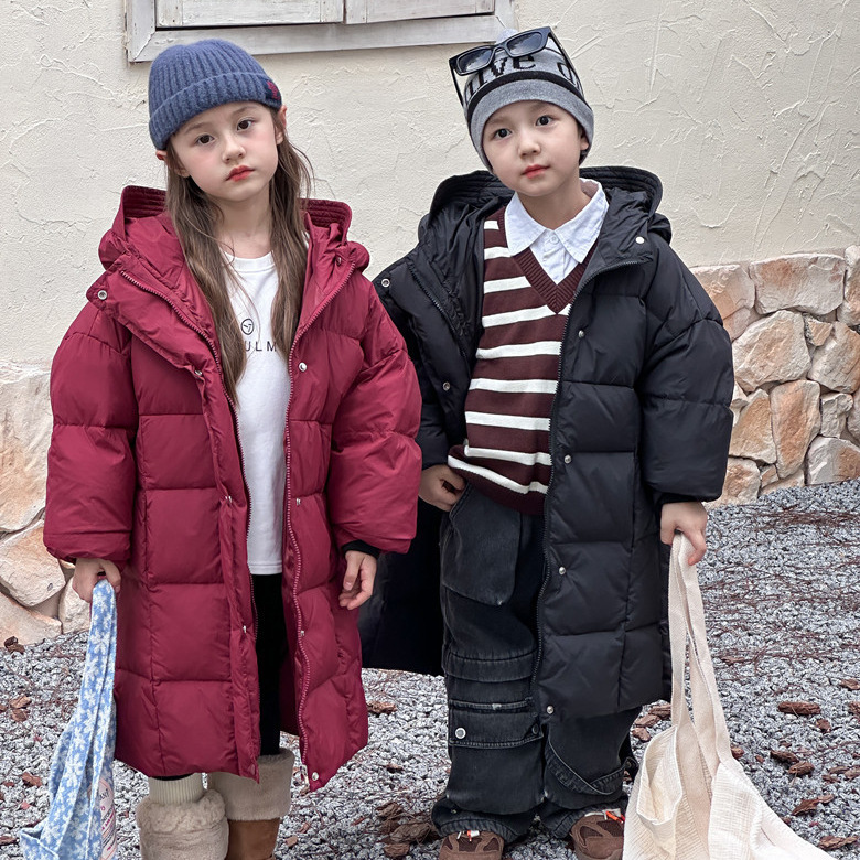 Thickened children's long over-the-knee down jacket, new style, white duck velvet, suitable for medium and large children, warm for winter.