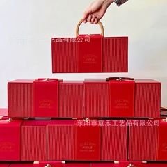 禾湾ヨーロッパ式の軽い豪華な皮質は喜糖箱の結婚祝いの花嫁の手のギフトボックスを持っています。