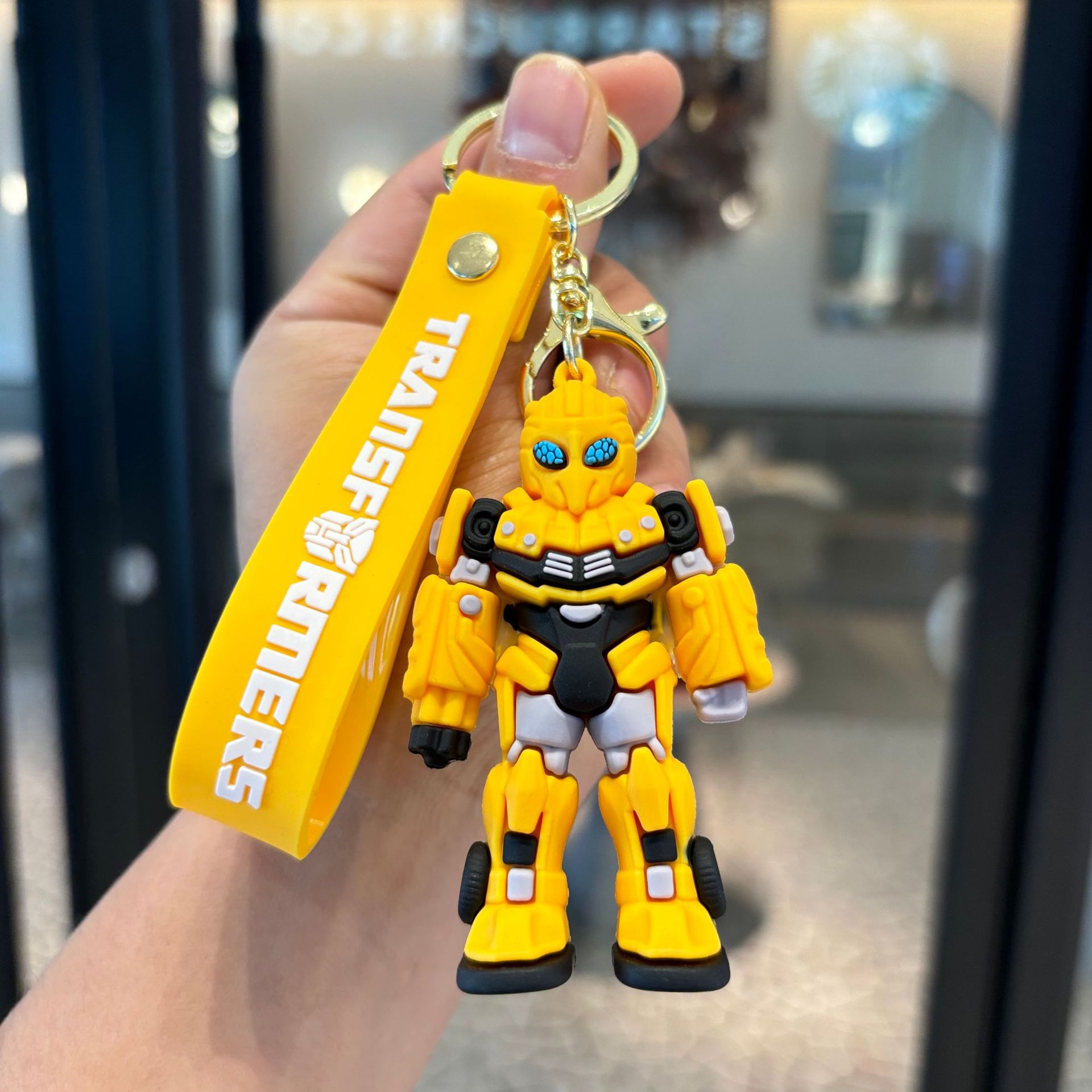 Nuevos productos Transformers colgante llavero tira muñeca máquina de pareja colgante transfronterizo exclusivo para la abeja creativa