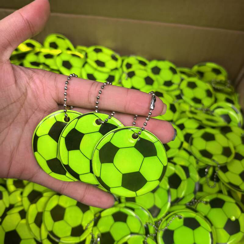 Strict selection of cross-border Amazon TEMU5 cm basketball five-pointed star football smiling face reflective pvc night backpack pendant