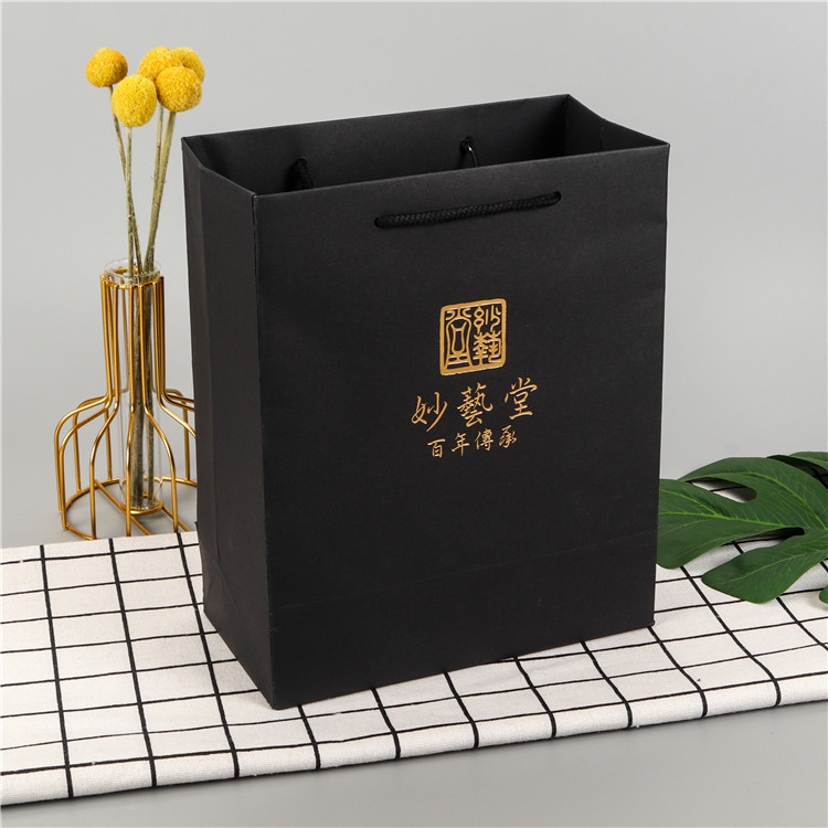 厂家小批量牛皮纸袋手提纸袋商场礼品包装袋服装购物纸袋印logo