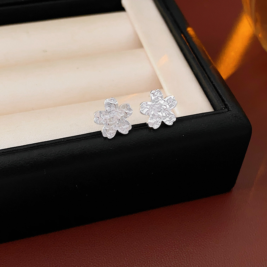 Pendientes de flor de lazo elegante de súper hada de plata Pendientes de moda de lujo ligero francés Pendientes de todo fósforo dulce de estilo literario