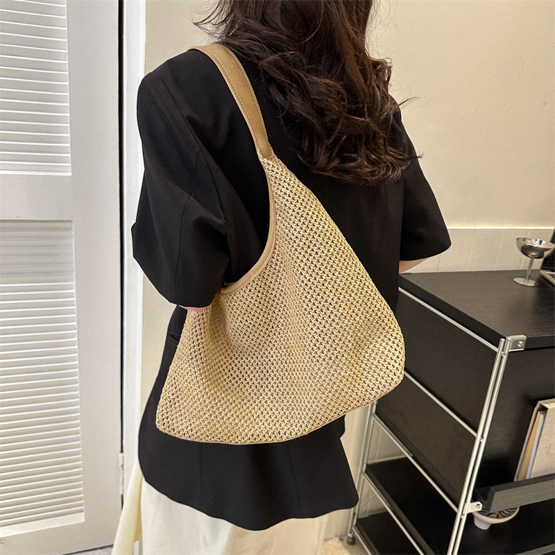 Bolso casual de gran capacidad tejido de moda de este año 2023 primavera y verano nuevo bolso de mano portátil de paja