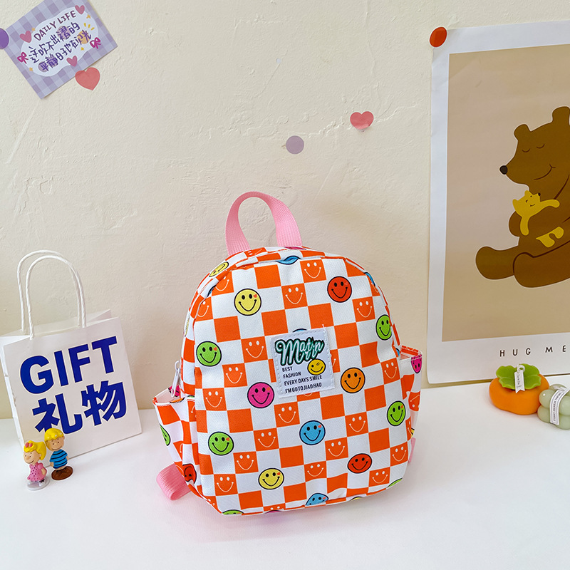 Mochila de color caramelo para niños 2022 nueva mochila de niño casual todo partido niños y niñas lindos mochila anti-Perdida