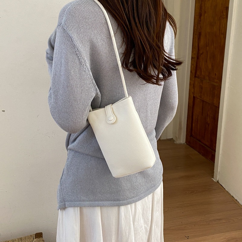 Nuevo mochila ligero verano 2026 teléfono móvil cuero suave versátil cubo de transporte mini mochila de hombro mujer estilo coreano