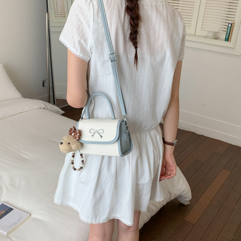 Bolso de arco rosa portátil para mujeres 2026 nuevo bolso de hombro de verano popular bolso de moda lindo