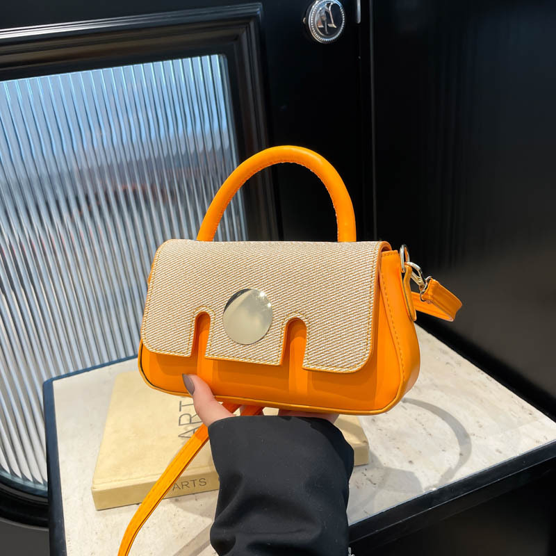 Bolsos populares de este año para mujer 2025 primavera nuevo estilo pequeño bolso de mujer fresco bolso de mensajero de moda temperamento pequeño bolso cuadrado portátil