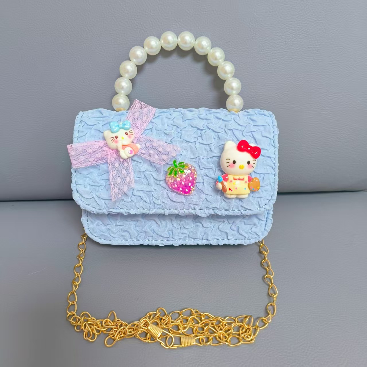 Bow Pearl Princess Handbag Meileti Kulomi Girl Año Nuevo Cartera pequeña bolsa de cadena de viento fragante