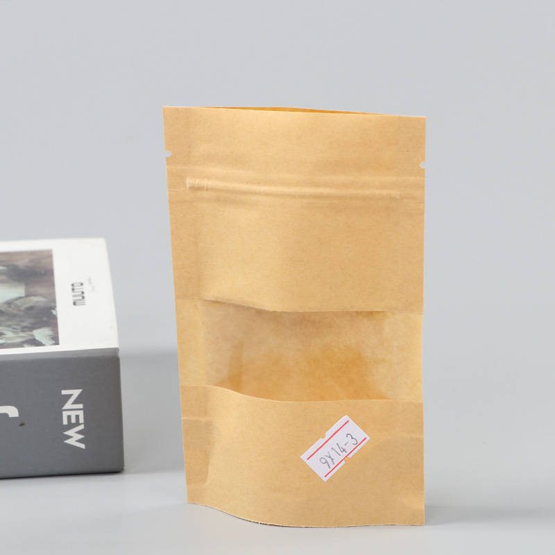 Spot bolsa de papel kraft con ventana transparente bolsa de embalaje de alimentos autosellada autoportante bolsa de té sellada de ocho lados fácil de rasgar
