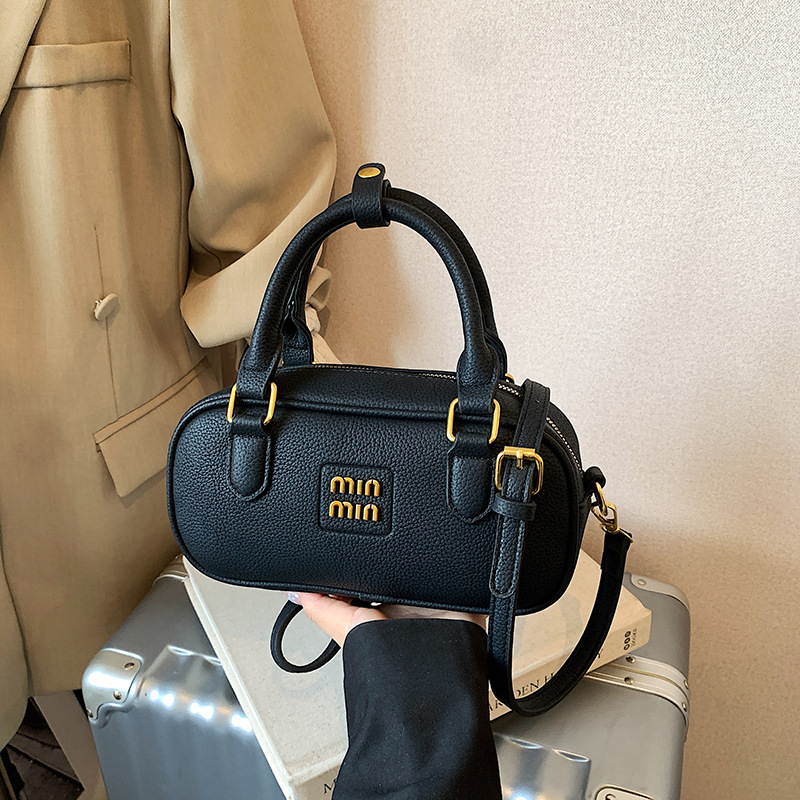 Bolsa de bolos retrógrada 2026 nueva moda ligera de lujo bolso cuadrado bolso de hombro universal