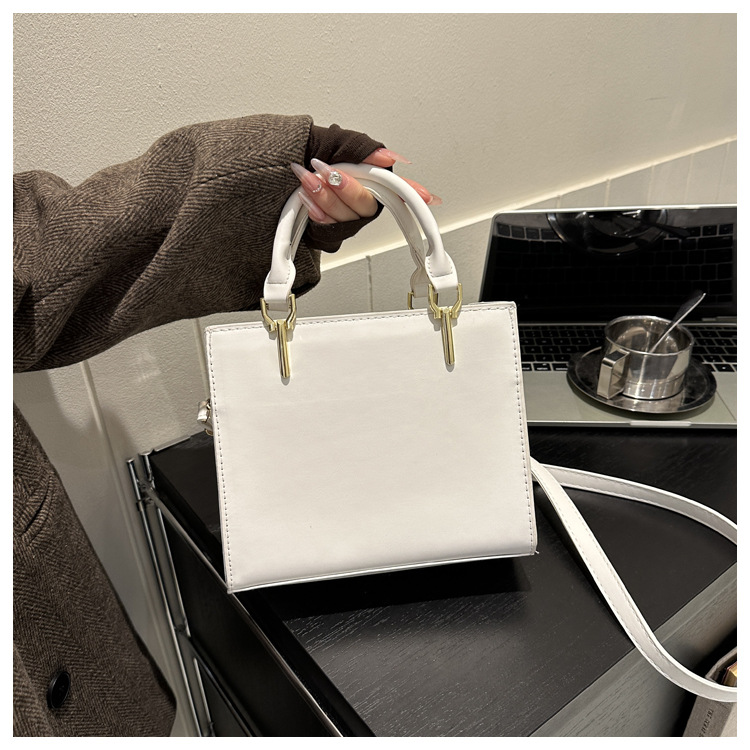 Alta textura moda simple hilo de coser bolsa personalizada bolso de las mujeres 2023 invierno nuevo todo-fósforo crossbody bolso de hombro