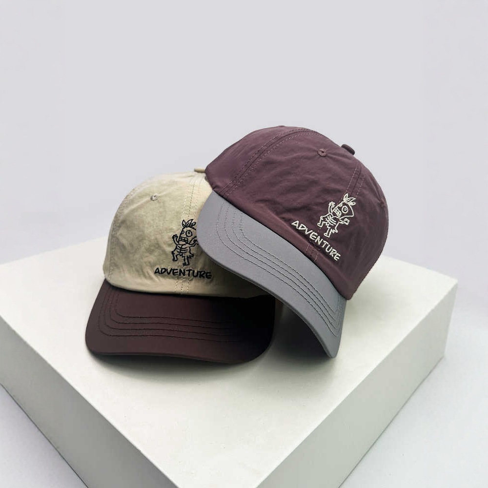 Primavera y verano nuevo estilo japonés bordado letras de dibujos animados sombrero de béisbol de color masculino y femenino sombrero de sombra retro lindo pato