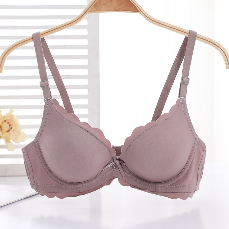Fábrica de sujetadores de Shantou en stock brillante sin marcas de grosor pequeño sujetador de ropa interior para mujeres ajustable soporte superior para evitar caída