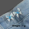 Oil dripping butterfly silver background blue