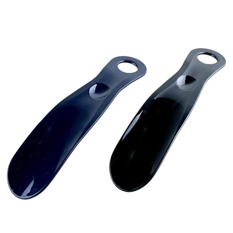 Calzador de plástico en stock, pequeño y exquisito, fácil de transportar, disponible al por mayor, se puede usar como un artículo promocional.