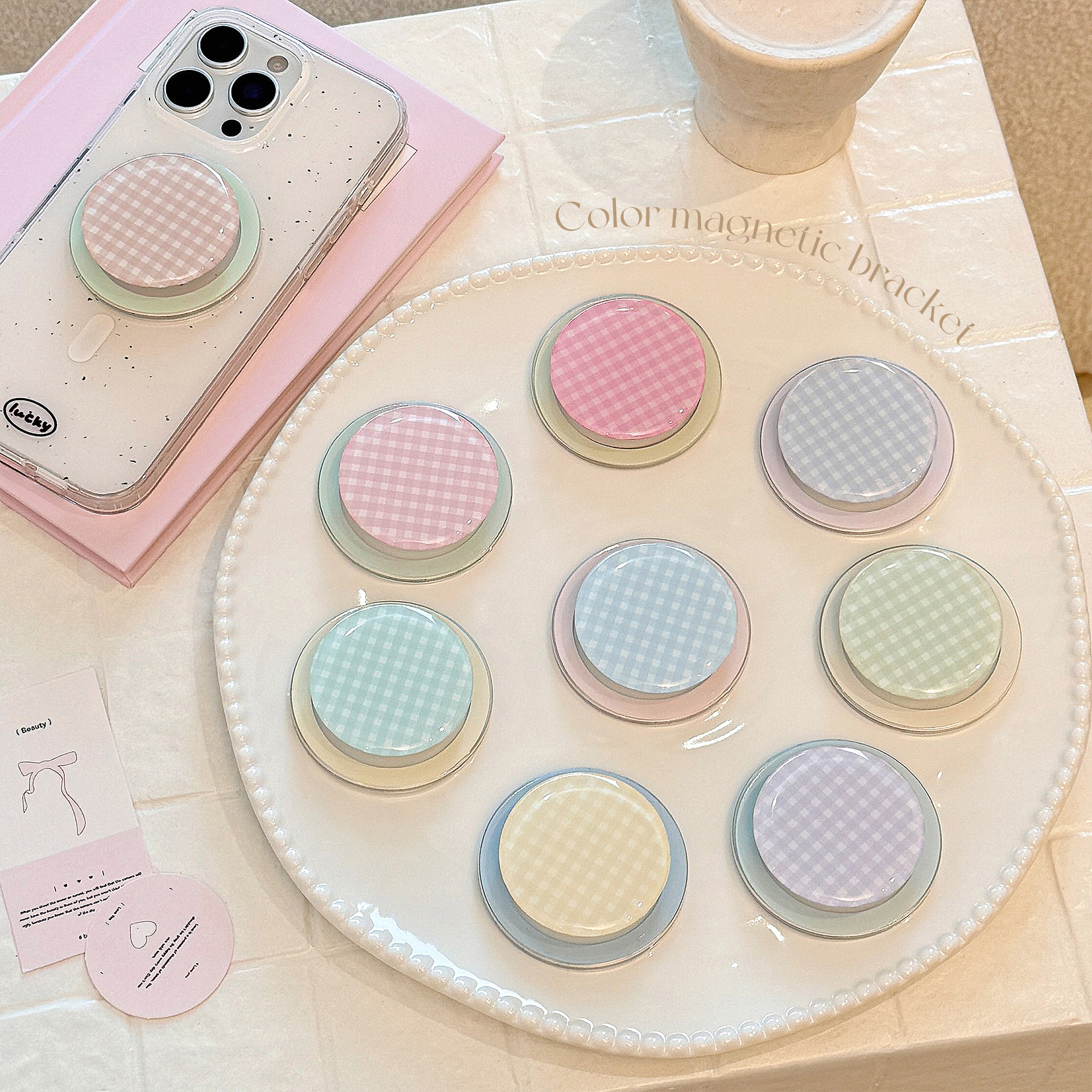 Estilo ins coreano, color de contraste de nicho, adecuado para soporte magnético MagSafe, soporte de airbag retráctil de adsorción para mujer